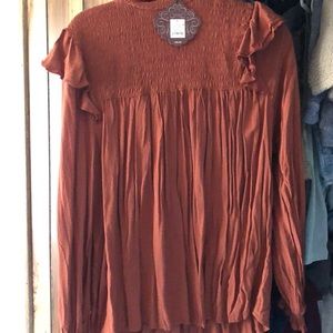 Rust color blouse